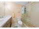 Tiled bathroom with glass door shower and modern vanity at 3123 Westbrook Trce, Lawrenceville, GA 30044