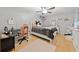 Bedroom with hardwood floors, pastel colors, and a gaming chair at 3123 Westbrook Trce, Lawrenceville, GA 30044