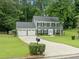 Charming two-story home with a well manicured lawn at 3123 Westbrook Trce, Lawrenceville, GA 30044