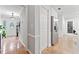 Foyer features tile flooring, gray walls, a staircase, and entry to the kitchen and front door at 3123 Westbrook Trce, Lawrenceville, GA 30044