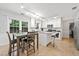 Eat-in kitchen with a center island, stainless steel appliances, and tile flooring at 3123 Westbrook Trce, Lawrenceville, GA 30044