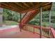 Charming deck offering outdoor living and dining space with wooded views at 3439 Tupelo Trail, Auburn, GA 30011