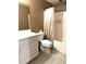 Bathroom features a white vanity and a shower/tub combo at 3439 Tupelo Trail, Auburn, GA 30011