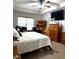 Bedroom features a desk, dresser, and ceiling fan at 3439 Tupelo Trail, Auburn, GA 30011