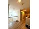 Upstairs hallway with hard floors, neutral walls and plenty of natural light at 3439 Tupelo Trail, Auburn, GA 30011
