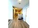 Upstairs hallway with hard floors, neutral walls and plenty of natural light at 3439 Tupelo Trail, Auburn, GA 30011