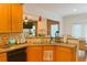 Well-lit kitchen boasts stainless steel appliances, spacious countertops, and an open design at 3439 Tupelo Trail, Auburn, GA 30011