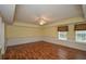Large open living room featuring hardwood floors and natural light at 3439 Tupelo Trail, Auburn, GA 30011