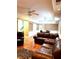 Spacious living room with wood floors and leather couches at 3439 Tupelo Trail, Auburn, GA 30011