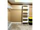 Walk-in Closet with shelving and rack system at 3439 Tupelo Trail, Auburn, GA 30011