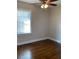 Bedroom featuring hardwood floors, neutral paint, a ceiling fan and natural light at 2367 Cascade Rd # B7, Atlanta, GA 30311