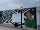 Outdoor mural art featuring a black Personal, Cascade Heights sign and street lamp at 2367 Cascade Rd # B7, Atlanta, GA 30311