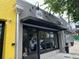 Barúque ATL shop storefront with a black awning and modern glass window entrance at 2367 Cascade Rd # B7, Atlanta, GA 30311