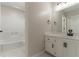 Clean bathroom featuring a tub/shower combination and a vanity with black hardware at 4252 Keheley Lake Dr, Marietta, GA 30066