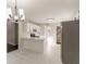 Bright kitchen with stainless steel appliances, white cabinets, and breakfast bar area at 4252 Keheley Lake Dr, Marietta, GA 30066