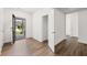 View of entryway with wood floor, door to the outside and closet at 55 Black Rock Rdg, Sharpsburg, GA 30277