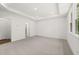 Spacious main bedroom with recessed lighting, large windows, and carpet floors at 55 Black Rock Rdg, Sharpsburg, GA 30277