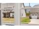 Exterior view of neighborhood homes as seen through window at 55 Black Rock Rdg, Sharpsburg, GA 30277