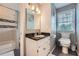 Cozy bathroom with a bathtub and shower combo, and modern vanity at 3314 Eagle Watch Dr, Woodstock, GA 30189