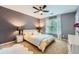 Well-lit bedroom with modern decor, a large window, and neutral colors at 3314 Eagle Watch Dr, Woodstock, GA 30189