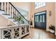 Grand foyer with hardwood floors, staircase, and a large front door allowing ample natural light at 3314 Eagle Watch Dr, Woodstock, GA 30189