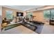Home gym area with a full set of workout equipment and a large TV at 3314 Eagle Watch Dr, Woodstock, GA 30189
