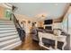 Spacious living room featuring a fireplace, hardwood floors, and natural light at 3314 Eagle Watch Dr, Woodstock, GA 30189