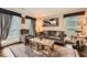 Cozy living room with hardwood floors, stylish furnishings, and bright windows at 3314 Eagle Watch Dr, Woodstock, GA 30189