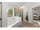 Bright bathroom with separate shower and soaking tub; the perfect retreat at 5901 Cobblestone Creek Cir, Mableton, GA 30126