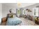 Bright bedroom with a large window and toy storage for a playful and organized space at 5901 Cobblestone Creek Cir, Mableton, GA 30126