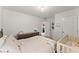 Cozy bedroom featuring a crib and a double bed with decorative bedding at 5901 Cobblestone Creek Cir, Mableton, GA 30126