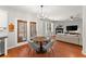 Kitchen with adjacent breakfast area featuring a round table and pendant lighting at 5901 Cobblestone Creek Cir, Mableton, GA 30126