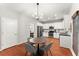 Open concept kitchen with modern stainless steel appliances and dark counters at 5901 Cobblestone Creek Cir, Mableton, GA 30126