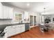 Kitchen area with seating and view into the living area at 5901 Cobblestone Creek Cir, Mableton, GA 30126