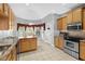 Charming kitchen with stainless appliances, tile floors, and a breakfast nook at 9634 Coastal Pointe Dr, Villa Rica, GA 30180