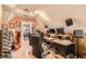 A recording room with music posters, a studio desk and a guitar on display at 180 Moseley Crossing Dr, Stockbridge, GA 30281