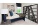 Stylish bedroom featuring modern decor, a large window, and a unique bookshelf at 2686 Ne Almand Ne Ln, Conyers, GA 30013