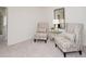 Inviting sitting room with neutral tones and stylish accent chairs at 2686 Ne Almand Ne Ln, Conyers, GA 30013