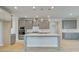 Modern kitchen featuring gray cabinets, a center island, and stainless steel appliances at 100 Homesite Valleyview Ct, Mcdonough, GA 30252