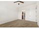 Simple empty bedroom features tan carpet and ensuite bathroom access at 3635 E Paces Ne Cir # 1405, Atlanta, GA 30326