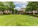 Beautifully landscaped courtyard with a gazebo and manicured green lawn at 3635 E Paces Ne Cir # 1405, Atlanta, GA 30326