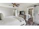 Bright main bedroom with wood floors and ensuite bathroom at 142 Holly Mill Village Dr, Canton, GA 30114