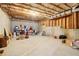 Large unfinished basement space features concrete floor, exposed ceiling, and ample room for customization at 2452 Stone Manor Ne Dr, Buford, GA 30519