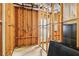 Unfinished basement space featuring exposed piping and utility connections at 2452 Stone Manor Ne Dr, Buford, GA 30519