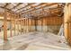 Spacious unfinished basement with concrete floor, framed walls, and exposed ceiling awaits personalization at 2452 Stone Manor Ne Dr, Buford, GA 30519