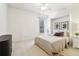 Bright bedroom with a cozy built-in bed frame, fan, and carpeted floors at 2452 Stone Manor Ne Dr, Buford, GA 30519