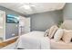 Well-lit bedroom with a plush bed and an ensuite bathroom at 2452 Stone Manor Ne Dr, Buford, GA 30519