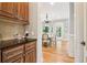 Sun-drenched breakfast nook with views into a dining room at 2452 Stone Manor Ne Dr, Buford, GA 30519