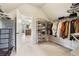 Spacious walk-in closet with custom shelving and storage solutions at 2452 Stone Manor Ne Dr, Buford, GA 30519