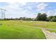 Community soccer field with a view of the neighborhood homes, a soccer net, and mature trees at 2452 Stone Manor Ne Dr, Buford, GA 30519